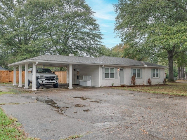 993 Greenview Rd, Collierville, TN 38017 - ranch-style house featuring asphalt driveway, a carport, and a chimney