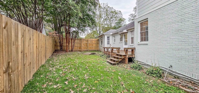 view of yard featuring a deck