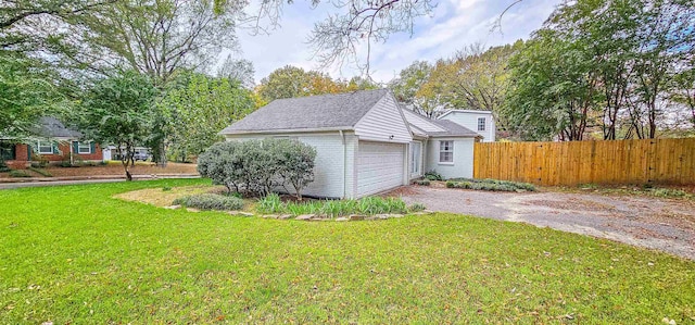 garage with a yard