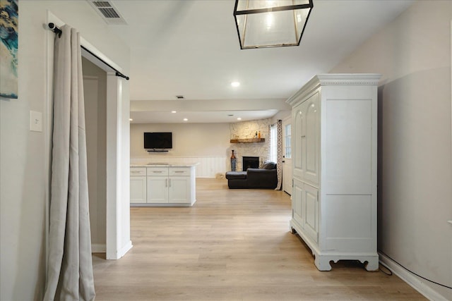 hall featuring light hardwood / wood-style floors