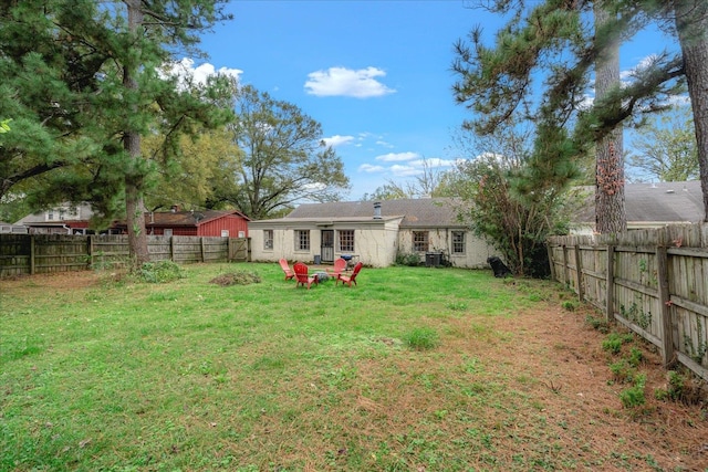 view of yard featuring central air condition unit