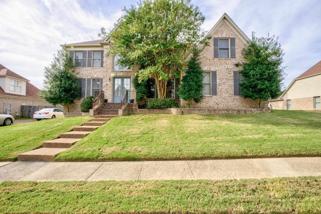 view of front facade featuring a front lawn