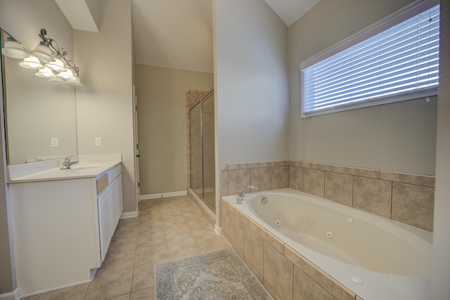 bathroom with tile patterned flooring, vanity, and independent shower and bath