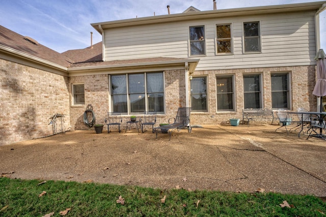 rear view of property with a patio