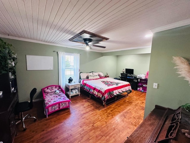 bedroom featuring hardwood / wood-style flooring, ceiling fan, wood ceiling, and crown molding