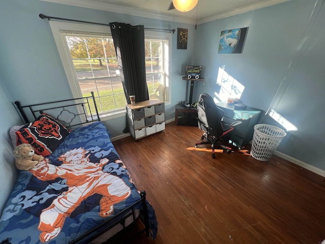 bedroom featuring dark hardwood / wood-style flooring and ornamental molding