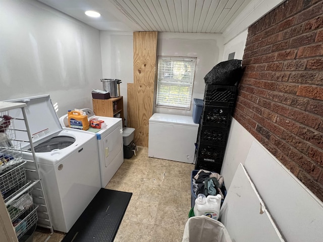 laundry room featuring independent washer and dryer