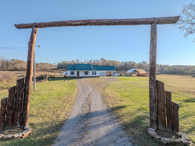 exterior space with a rural view