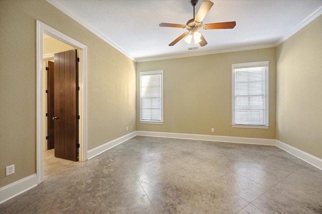 spare room featuring ceiling fan and ornamental molding