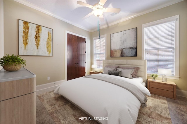 bedroom with ceiling fan and crown molding