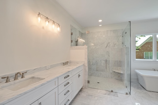 bathroom featuring vanity and independent shower and bath