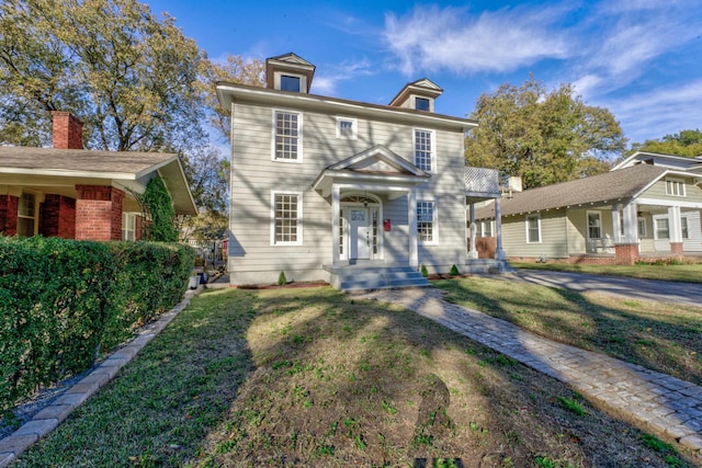 view of front of house featuring a front lawn