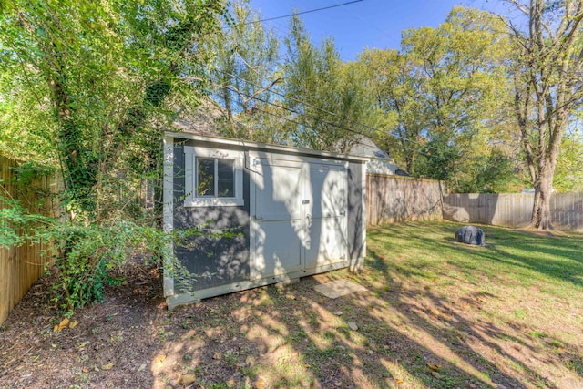 view of outdoor structure with a yard