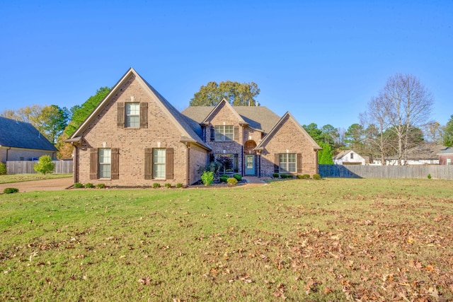 view of property with a front lawn