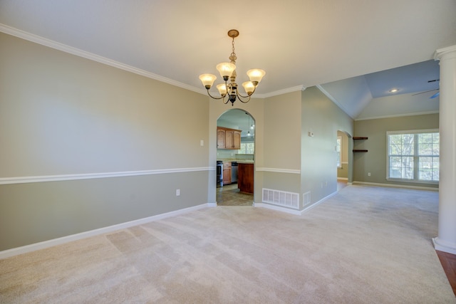 spare room featuring ceiling fan with notable chandelier, crown molding, light carpet, and vaulted ceiling