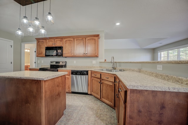 kitchen featuring pendant lighting, a center island, sink, appliances with stainless steel finishes, and light tile patterned flooring