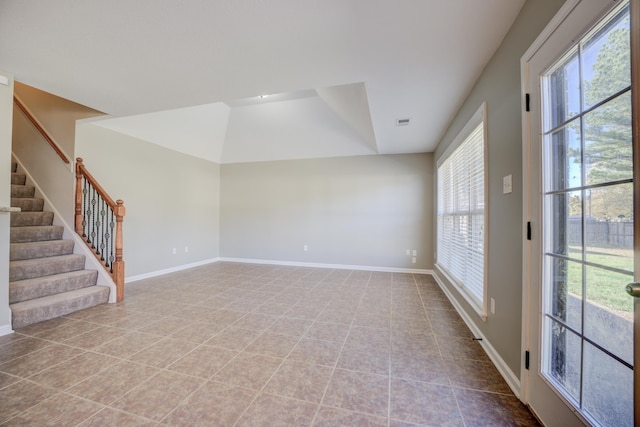 unfurnished room with light tile patterned floors