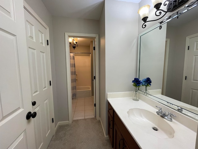 bathroom with tile patterned floors, shower / tub combo with curtain, and vanity