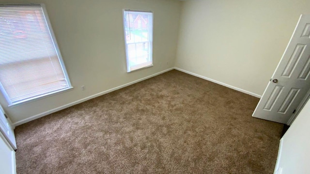 view of carpeted spare room