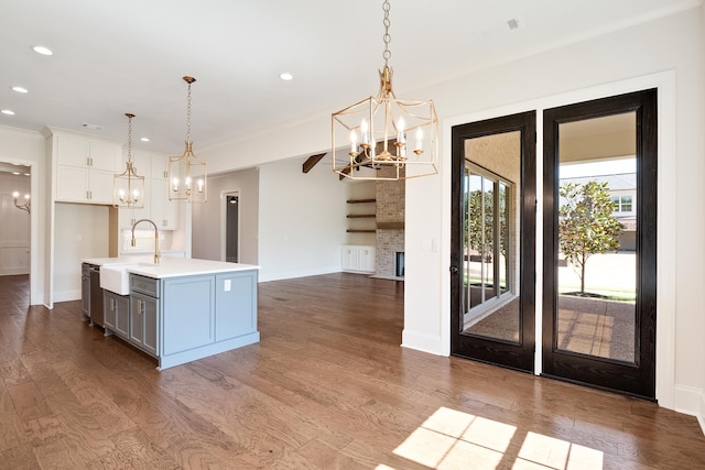 140 Magnolia Ridge Dr, Rossville, TN 38066 - kitchen with a chandelier, a sink, light countertops, baseboards, and recessed lighting