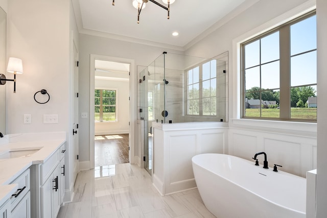 140 Magnolia Ridge Dr, Rossville, TN 38066 - full bathroom featuring a shower stall, a freestanding tub, vanity, a decorative wall, and marble finish floors