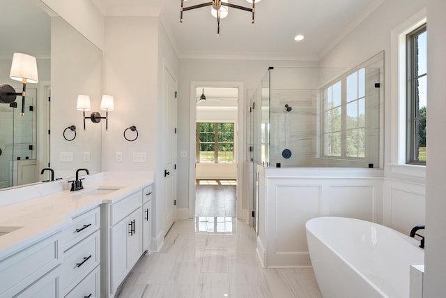 bathroom featuring vanity, crown molding, ceiling fan, and independent shower and bath