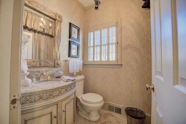 bathroom featuring tile patterned flooring, vanity, and toilet