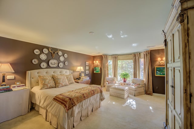 bedroom with light colored carpet and crown molding