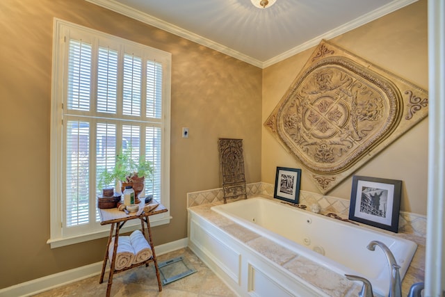 bathroom with a bathtub, a healthy amount of sunlight, and ornamental molding