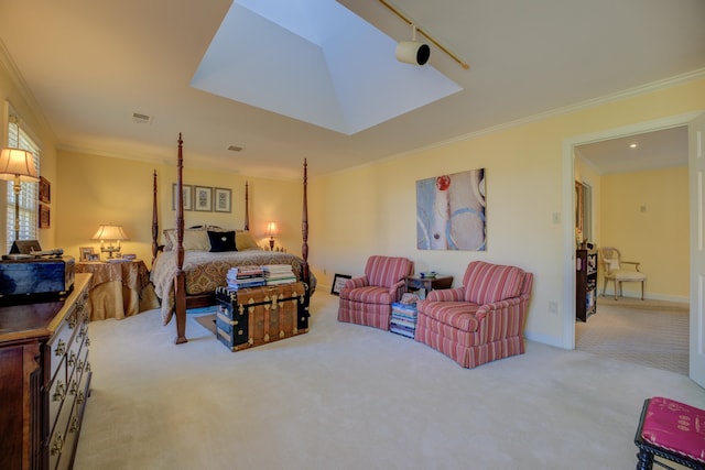 bedroom featuring rail lighting, ornamental molding, and light carpet