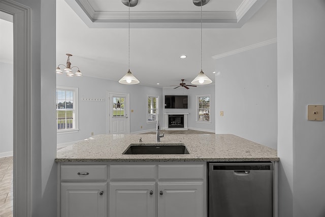 6 Laura Ln, Iuka, MS 38852 - kitchen with white cabinetry, sink, stainless steel dishwasher, crown molding, and ceiling fan with notable chandelier