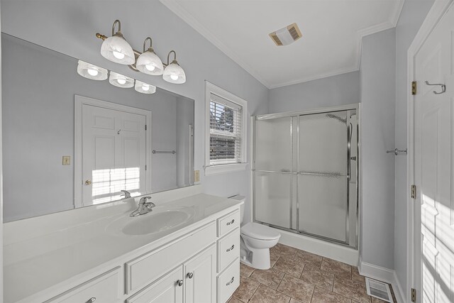 6 Laura Ln, Iuka, MS 38852 - bathroom with plenty of natural light, vanity, a shower with shower door, and ornamental molding