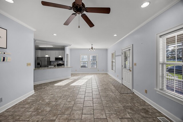 6 Laura Ln, Iuka, MS 38852 - unfurnished living room with sink, ceiling fan with notable chandelier, and ornamental molding