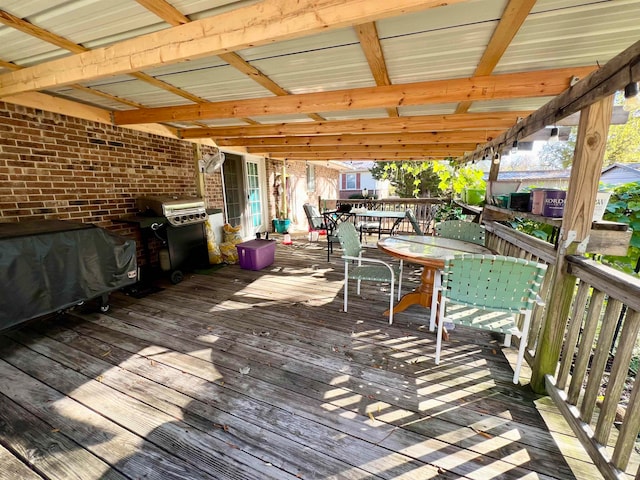 wooden deck with grilling area