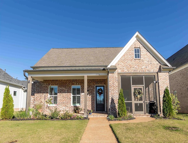 view of front of home featuring a front yard