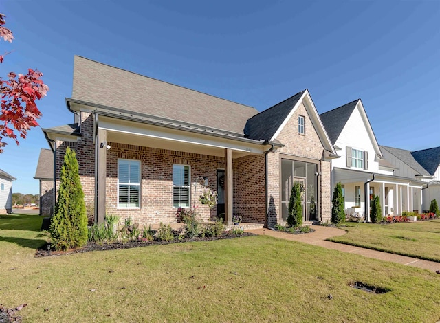 view of front facade with a front yard