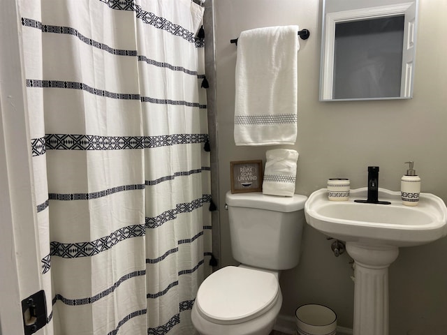bathroom featuring toilet