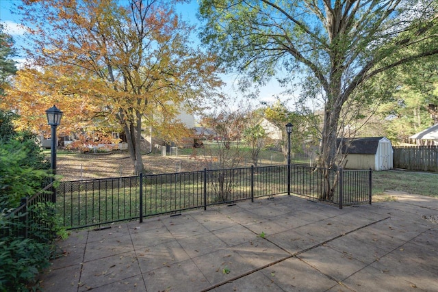 view of patio / terrace with a storage unit