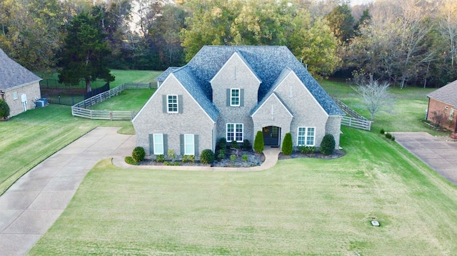 view of front of home with a front lawn