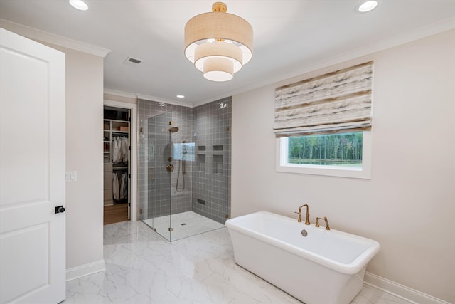 bathroom featuring ornamental molding and plus walk in shower