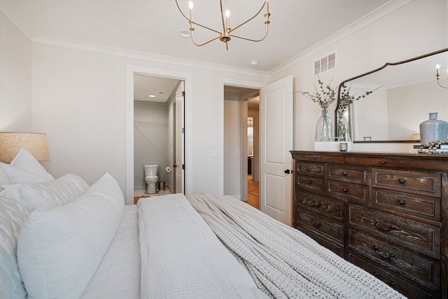 bedroom featuring ensuite bath and crown molding