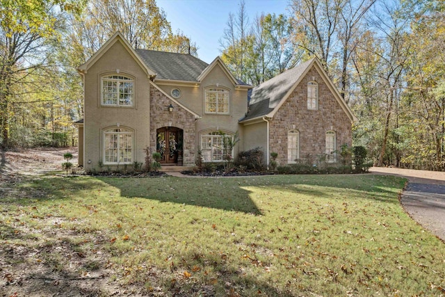 view of front of home with a front yard