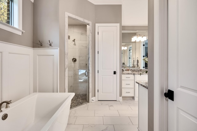 bathroom with vanity, separate shower and tub, and ornamental molding