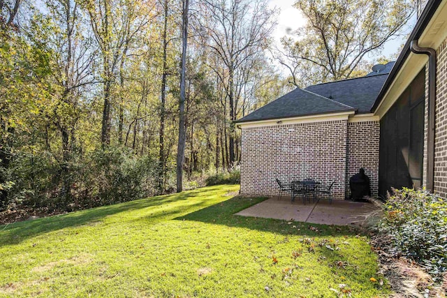 view of yard with a patio area