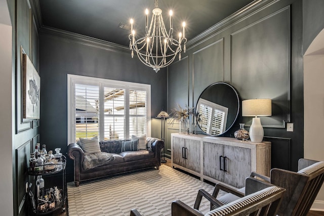 living room featuring ornamental molding and a chandelier