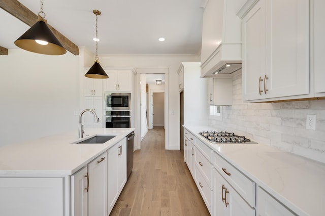 520 Valley Forge Ln, Rossville, TN 38066 - kitchen featuring a sink, appliances with stainless steel finishes, custom range hood, tasteful backsplash, and white cabinetry