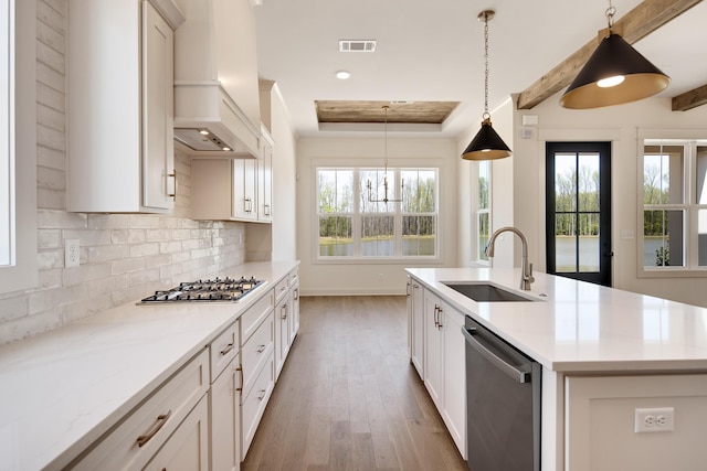 520 Valley Forge Ln, Rossville, TN 38066 - kitchen with stainless steel appliances, a sink, custom range hood, wood finished floors, and plenty of natural light