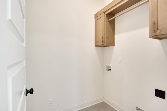 520 Valley Forge Ln, Rossville, TN 38066 - laundry room featuring electric dryer hookup, washer hookup, cabinet space, baseboards, and tile patterned floors