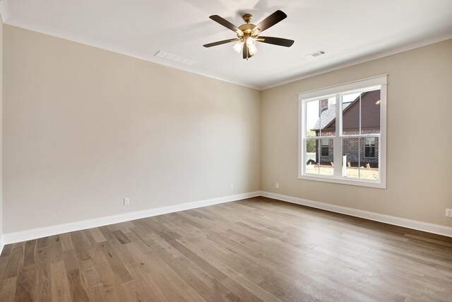 520 Valley Forge Ln, Rossville, TN 38066 - empty room with crown molding, baseboards, wood finished floors, and a ceiling fan