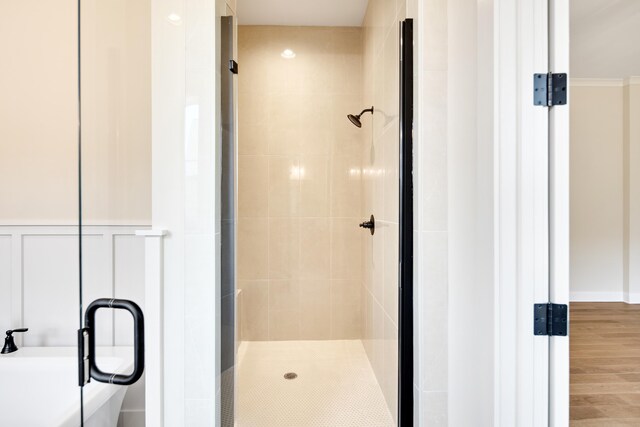 520 Valley Forge Ln, Rossville, TN 38066 - full bath with a shower stall, wood finished floors, and a freestanding bath